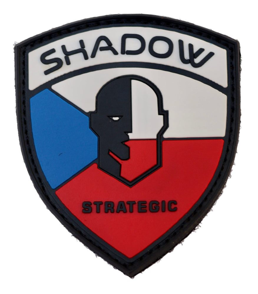 Czech republic Shield-shaped patch with 'Shadow Strategic' text and a stylized face design on a white background