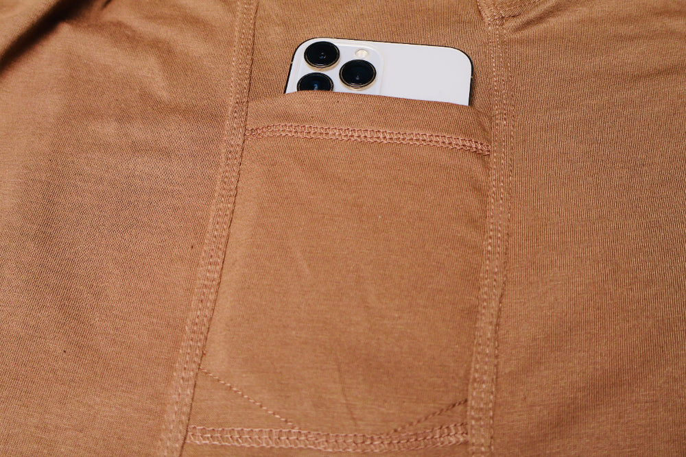 Smartphone in a Uniq underarm pocket of Tan or Coyote brown Operator Shirt 3089 by Shadow Strategic