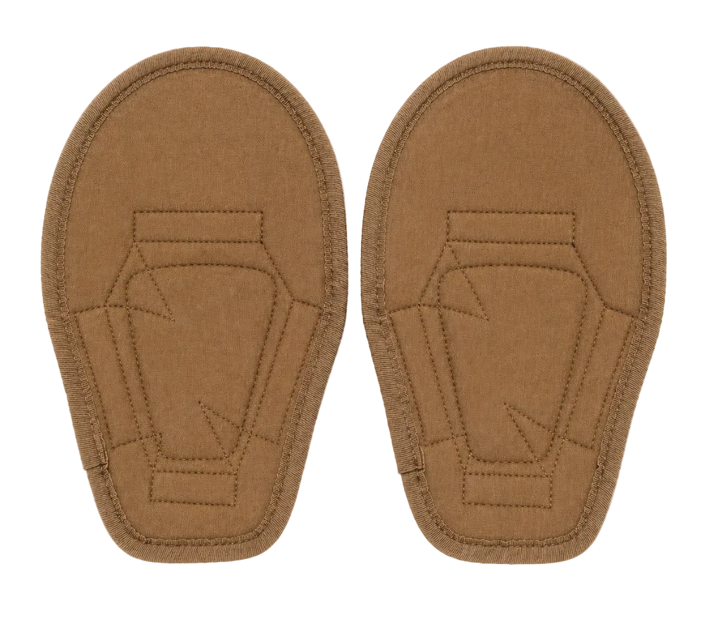 Pair of brown shoe inserts on a white background